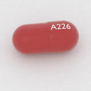 Amantadine 100 mg capsule: red, 18 mm, imprinted A226.