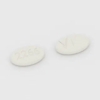 Baclofen 20 mg Tablette: weiß, oval, 16 mm, mit Bruchkerbe, Prägung 2266 auf der einen Seite und V auf der anderen.