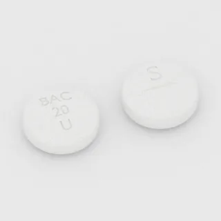 Baclofen 20 mg Tablette: weiß, rund, 11 mm, mit Bruchkerbe, Prägung BAC 20 U S.