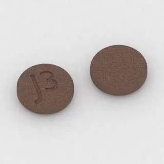 Chlorpromazine 50 mg tablet: brown, round, 7 mm, imprinted J3.
