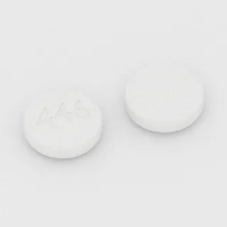 Karyzoprodol 350 mg, tabletka: biała, okrągła, 12 mm, z oznaczeniem 446.