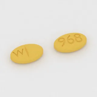 Betanecol 50 mg em comprimido: amarelo, oval, 7 mm, sulcado, com a gravação W de um lado e 968 do outro.