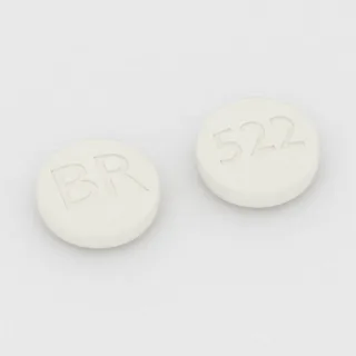 Tablet Bupropion 522 mg: putih, bulat, 11 mm, dengan kode cetak BR di satu sisi dan 522 di sisi lainnya.