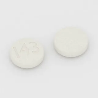 Karyzoprodol 250 mg, tabletka: biała, okrągła, 10 mm, z oznaczeniem I43.