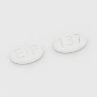 Benztropine 1 mg tablet: white, oval, 10 mm, scored, imprinted EP on one side and 137 on the other.