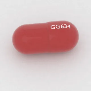 Amantadine 100 mg capsule: red, 18 mm, imprinted GG634.