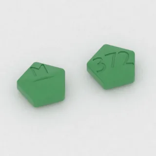 Cimetidine 400 mg tablet: green, five-sided, 11 mm, scored, imprinted M on one side and 372 on the other.