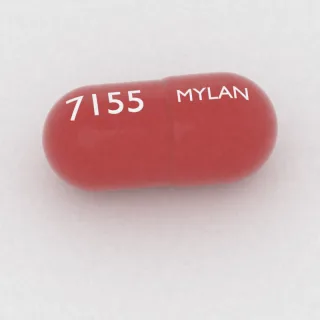 Budesonide 3 mg capsule: red, 18 mm, imprinted MYLAN on one side and 7155 on the other.
