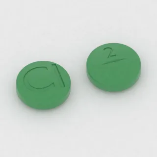 Cimetidine 400 mg tablet: green, round, 12 mm, scored, imprinted CI on one side and 2 on the other.