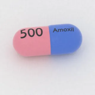 Kapsul Amoksisilin 500 mg: biru dan merah muda, 23 mm, dengan kode cetak Amoxil di satu sisi dan 500 di sisi lainnya.