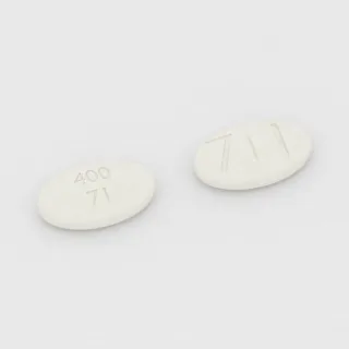 Cimetidine 400 mg tablet: white, oval, 14 mm, scored, imprinted 400 71 71.