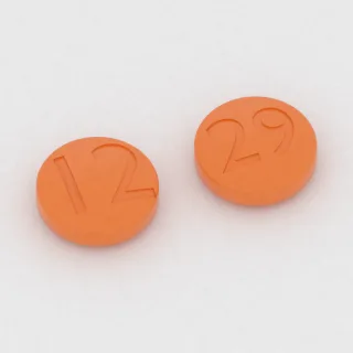 Amitriptilin 100 mg tablet: turuncu, yuvarlak, 11 mm, bir yüzünde 12, diğer yüzünde 29 baskısı var.