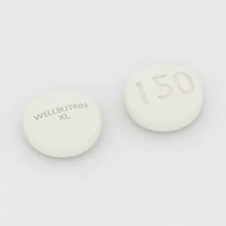 Bupropion 150 mg tablet: beyaz, yuvarlak, 7 mm, üzerinde WELLBUTRIN XL 150 baskısı var.