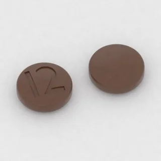 Amitriptilin 25 mg tablet: kahverengi, yuvarlak, 7 mm, üzerinde I2 baskısı var.
