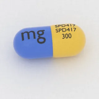Carbamazepine 300 mg capsule: yellow and blue, 22 mm, imprinted SPD417 SPD417 300 mg.