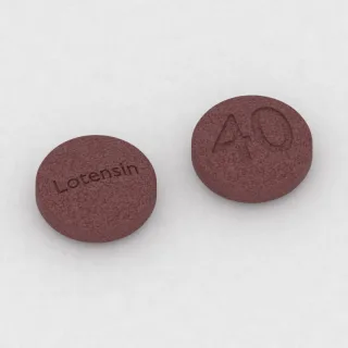 Benazepryl 40 mg, tabletka: czerwona, okrągła, 8 mm, z oznaczeniem Lotensin po jednej stronie i 40 po drugiej.
