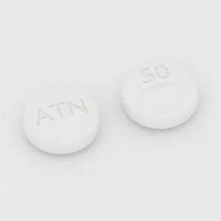 Atenolol 50 mg tablet: white, round, 8 mm, scored, imprinted ATN on one side and 50 on the other.