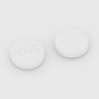 एसाइक्लोविर 400 mg टैबलेट: सफ़ेद, गोल, 12 mm, इम्प्रिंट Y212।