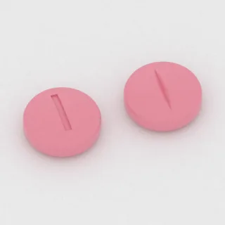 Bisoprolol 5 mg tablet: pink, round, 6 mm, scored, imprinted I.