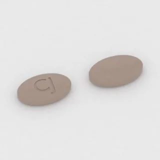 Karbidopa + lewodopa 18.75 mg / 75 mg / 200 mg, tabletka: brązowa, owalna, 14 mm, z oznaczeniem CJ.