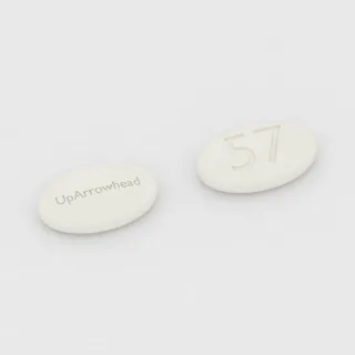 Carvedilol 12.5 mg tablet: white, oval, 10 mm, imprinted UpArrowhead on one side and 57 on the other.