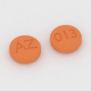 Aspirin 81 mg tablet: orange, round, 7 mm, imprinted AZ on one side and 013 on the other.