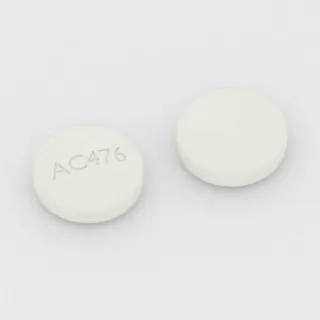 Akamprozat 333 mg, tabletka: biała, okrągła, 10 mm, z oznaczeniem AC476.