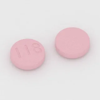 Bizmut subsalisilat 262 mg tablet: pembe, yuvarlak, 15 mm, üzerinde 118 baskısı var.