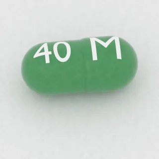 Klindamycyna 75 mg, kapsułka: zielona, 16 mm, z oznaczeniem M po jednej stronie i 40 po drugiej.