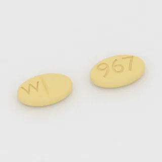 Betanecol 25 mg em comprimido: amarelo, oval, 7 mm, sulcado, com a gravação W de um lado e 967 do outro.