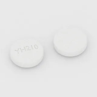 Cilostazol 100 mg tablet: white, round, 10 mm, imprinted YH210.