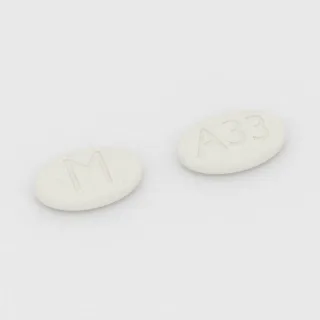 Armodafinil 250 mg tablet: white, oval, 15 mm, imprinted M on one side and A33 on the other.