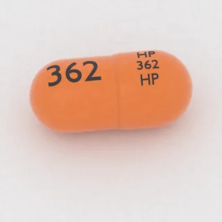 Amantadine 100 mg capsule: orange, 18 mm, imprinted HP 362 HP 362.