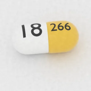 Atomoxetine 18 mg capsule: yellow and white, 19 mm, imprinted 266 on one side and 18 on the other.