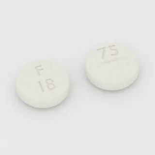 Klindamycyna 75 mg, tabletka: biała, okrągła, 8 mm, z linią podziału, z oznaczeniem F 18 75.