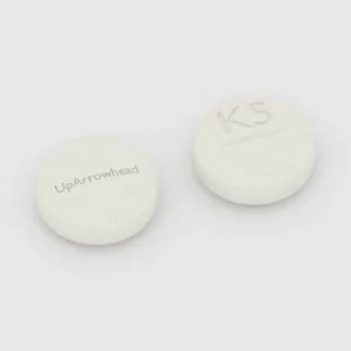 Clomiphene 50 mg tablet: white, round, 9 mm, scored, imprinted UpArrowhead on one side and K5 on the other.