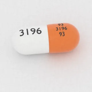 Cefadroksyl 500 mg, kapsułka: pomarańczowa i biała, 23 mm, z oznaczeniem 93 3196 93 3196.