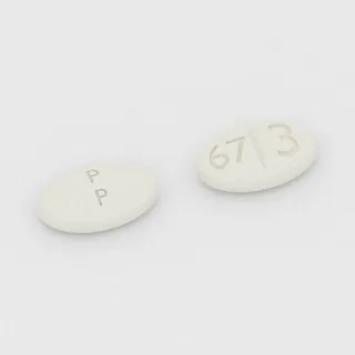 قرص كابرغولين 0.5 mg: أبيض، بيضاوي، 7 مم، محزّز، النقش P P 673.