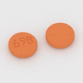 Benazepril 20 mg tablet: orange, round, 8 mm, imprinted 698.