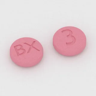 Brekspiprazol 3 mg, tabletka: różowa, okrągła, 6 mm, z oznaczeniem BX po jednej stronie i 3 po drugiej.