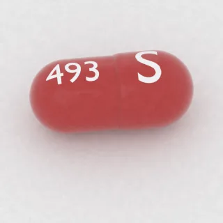 Amantadine 100 mg capsule: red, 18 mm, imprinted S on one side and 493 on the other.