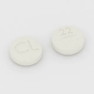 Tablet Klomifen 50 mg: putih, bulat, 9 mm, bergaris bagi, dengan kode cetak CL di satu sisi dan 22 di sisi lainnya.