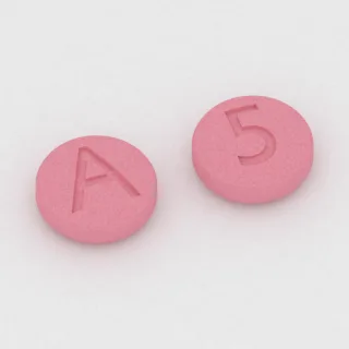 Citalopram 10 mg Tablette: rosa, rund, 5 mm, Prägung A auf der einen Seite und 5 auf der anderen.