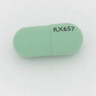 كبسولة سيفالكسين 500 mg: أخضر، 22 مم، النقش RX657.