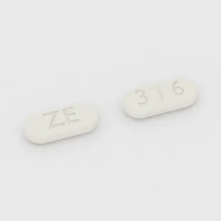 Buspirone 5 mg tablet: white, capsule-shaped, 8 mm, scored, imprinted ZE on one side and 36 on the other.
