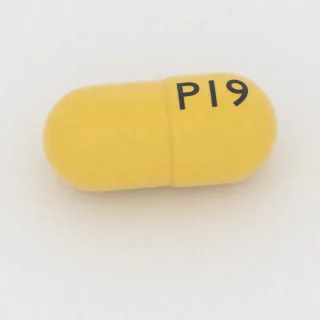 Amantadine 100 mg capsule: yellow, 16 mm, imprinted P19.