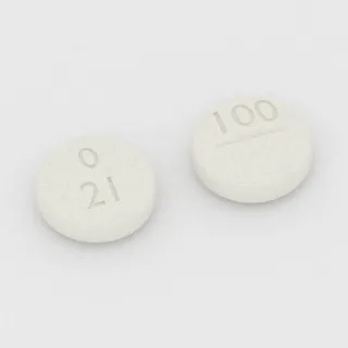 Allopurinol 100 mg tablet: white, round, 7 mm, scored, imprinted 0 21 100.