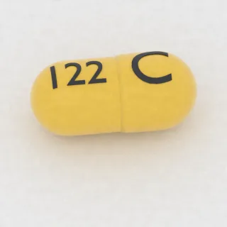 Amantadine 100 mg capsule: yellow, 7 mm, imprinted C on one side and 122 on the other.