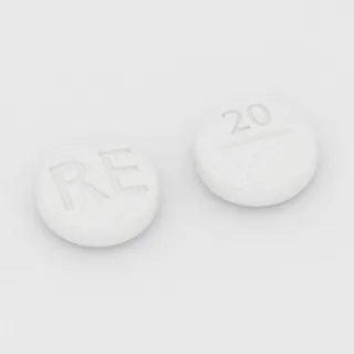 Atenolol 50 mg tablet: white, round, 7 mm, scored, imprinted RE on one side and 20 on the other.