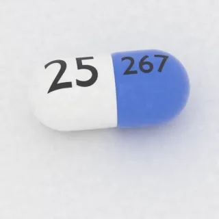 Atomoxetine 25 mg capsule: blue and white, 19 mm, imprinted 267 on one side and 25 on the other.